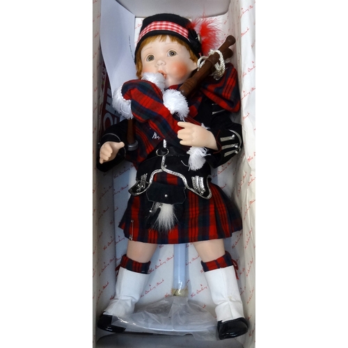 324 - THE DANBURY MINT COLLECTORS DOLLS
comprising two Scottish dolls, 'Bonnie' the Highland dancer and 'I... 