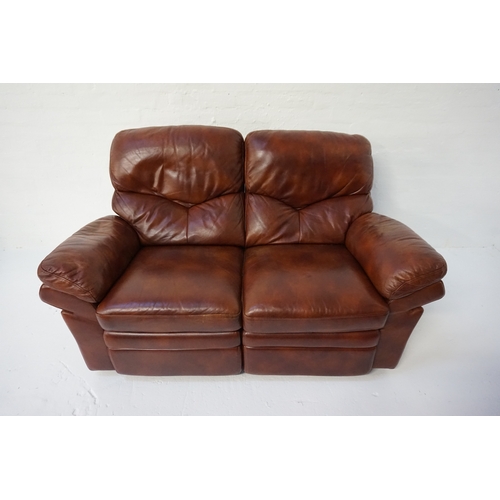 404 - BROWN LEATHER TWO SEATER RECLINING SETTEE raised on small feet, 164cm wide