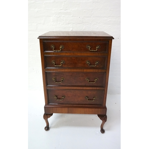 410 - EDWARDIAN WALNUT CHEST 
of four graduated brass handled drawers, raised on cabriole legs, 94.5cm hig... 