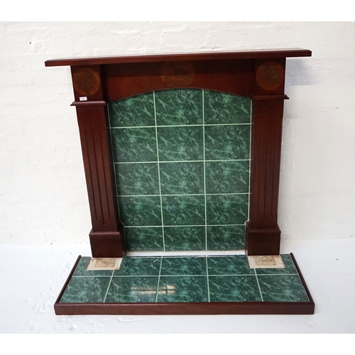 417 - HAND MADE MAHOGANY FIRE SURROUND 
with a moulded shelf above an arched frieze carved with a Whooper ... 