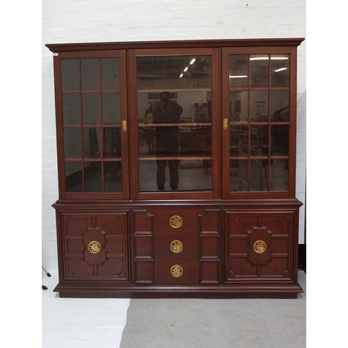 418 - LARGE CHINESE TEAK BOOKCASE 
the upper section with three glazed doors and shelved interior, above t... 