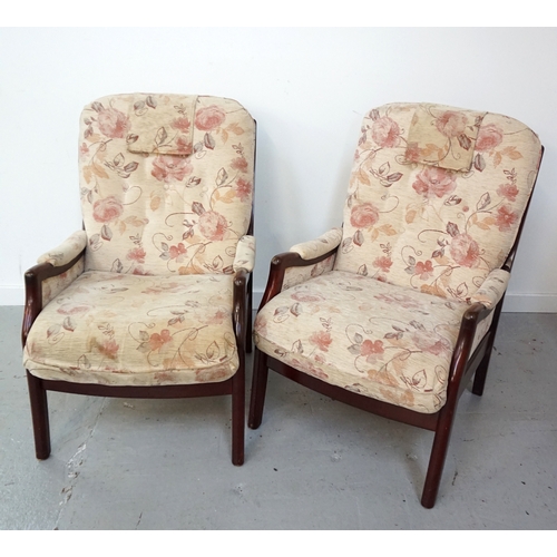 434 - PAIR OF ARMCHAIRS
with mahogany frames and button backs with stuffover seats and padded arms, standi... 