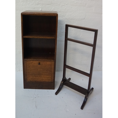 458 - 1950'S WALNUT FREE STANDING BOOKCASE
with a moulded top above two open shelves with a lower fall fla... 