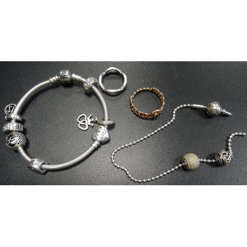 123 - SELECTION OF PANDORA JEWELLERY
comprising a Moments silver charm bracelet with two clips and five ch... 