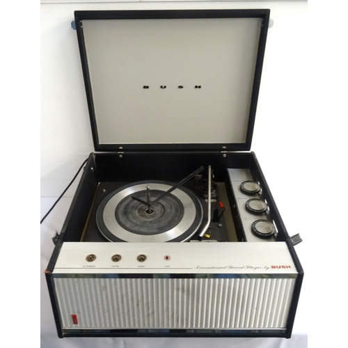 294 - BUSH RECORD PLAYER
with lift up lid revealing deck and volume controls, with integrated speaker to f... 