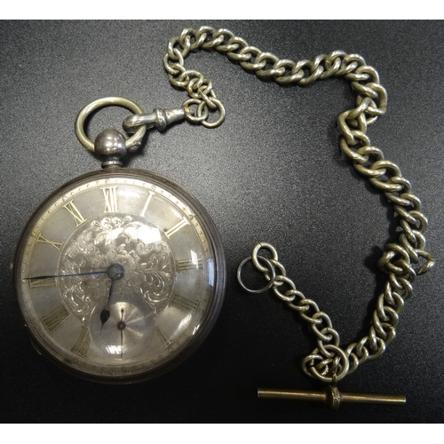 32 - VICTORIAN SILVER POCKET WATCH
the silvered dial with engraved floral decoration, Roman numerals, and... 