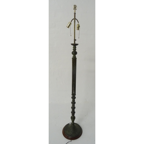 456 - VERDIGRIS COPPER STANDARD LAMP
raised on a circular base with a multi knopped column and fourteen tw... 