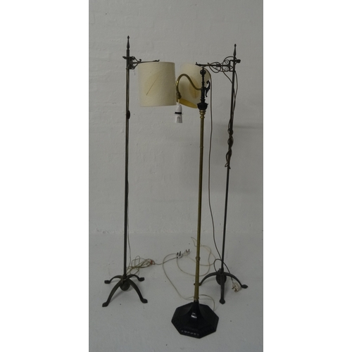 457 - PAIR OF STEEL STANDARD LAMPS
raised on a shaped base with four arched shaped supports, the column wi... 