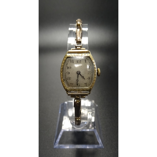 77 - LADIES EIGHTEEN CARAT GOLD ROLEX WRISTWATCH
circa 1920s, the dial with Arabic numerals, with 15 jewe... 