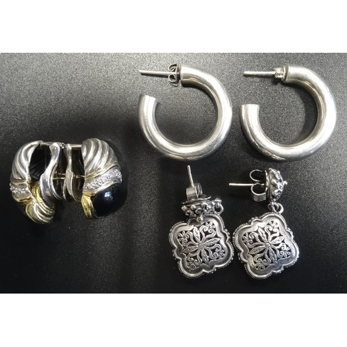 87 - THREE PAIRS OF SILVER EARRINGS
comprising one pair set with diamonds and with eighteen carat gold de... 