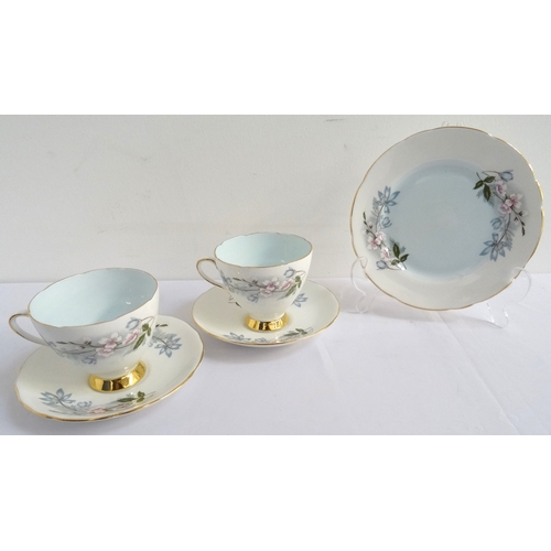 205 - GLADSTONE TEA SERVICE
the white and blue ground with floral decoration, comprising eleven cups and s... 