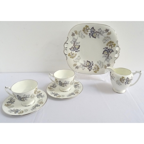 210 - COALPORT 'CAMELOT' PATTERN TEA SET
with floral decoration, comprising thirteen cups, fourteen saucer... 