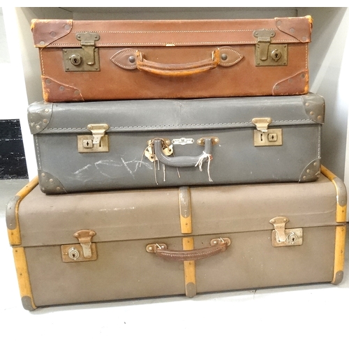 292 - LEATHER SUITCASE
with reinforced corners and carry handle, 61.5cm wide, a faux leather suitcase with... 