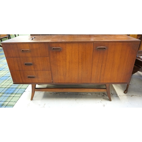 445 - SCHREIBER TEAK SIDE CABINET
with three drawers with recessed handles and a sliding and folding cupbo... 