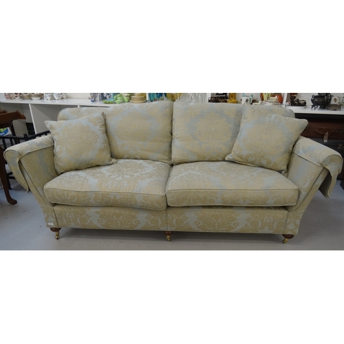 401 - LARGE DURESTA SOFA
with a shaped back with loose seat and back cushions, and two separate cushions, ... 