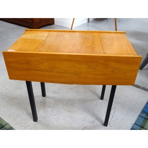 382 - VINTAGE TEAK SEWING TABLE
of oblong form with opposing end section drawers, standing on square block... 