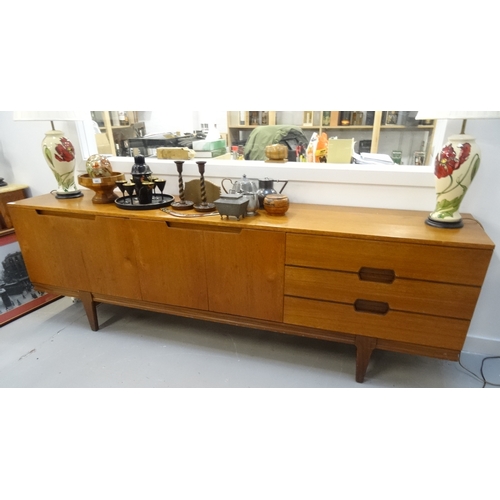 462 - VINTAGE RETRO UNIFLEX Q SERIES GUNTHER HOFFSTEAD TEAK SIDEBOARD
with a fall flap opening to reveal a... 