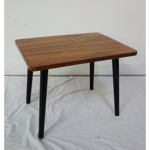 97 - 1960'S WALNUT LOW OCCASIONAL TABLE
the oblong top with rounded corners standing on ebonised splayed ... 