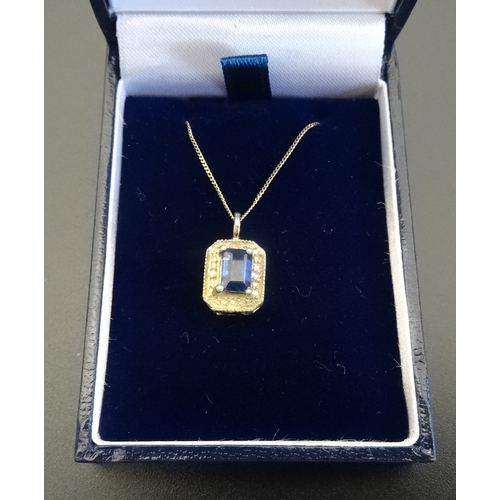 67 - SAPPHIRE AND DIAMOND PENDANT
the central sapphire flanked by two small diamonds to the illusion sett... 