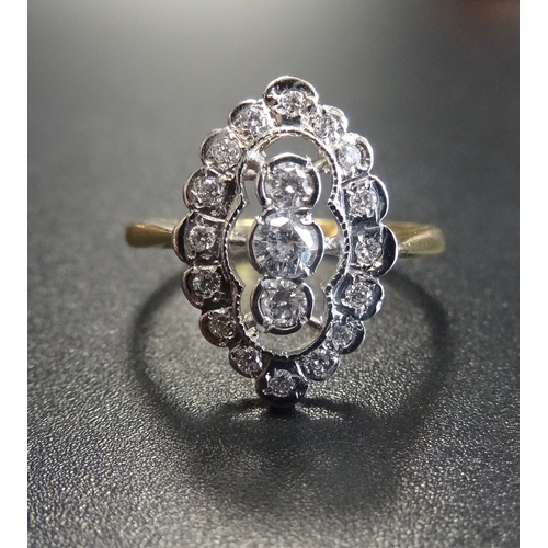 80 - ATTRACTIVE DIAMOND CLUSTER RING
the three central vertically set diamonds in further sixteen diamond... 