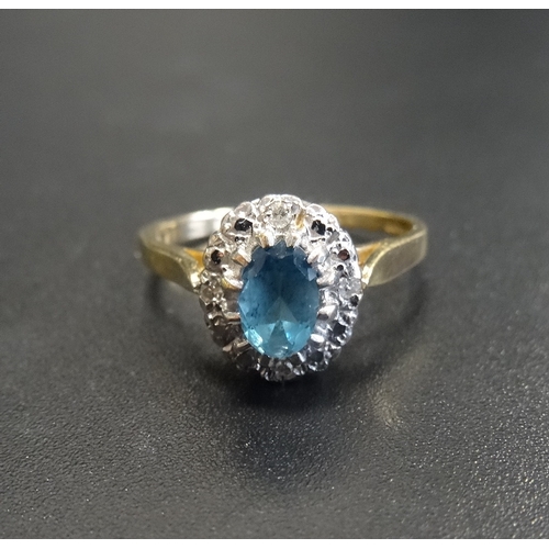 87 - BLUE TOPAZ AND DIAMOND CLUSTER RING
the central oval cut blue topaz with small diamonds to the illus... 