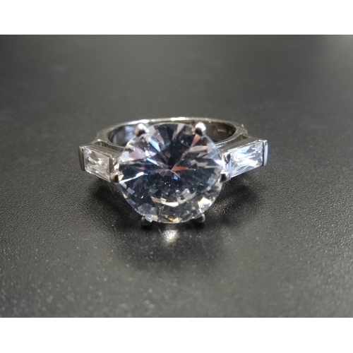 88 - CUBIC ZIRCONIA COCKTAIL RING
the central round cut stone approximately 4cts flanked by further CZ to... 