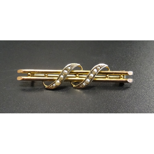 124 - EDWARDIAN SEED PEARL SET NINE CARAT GOLD BAR BROOCH
the seed pearl ribbons on double bar brooch