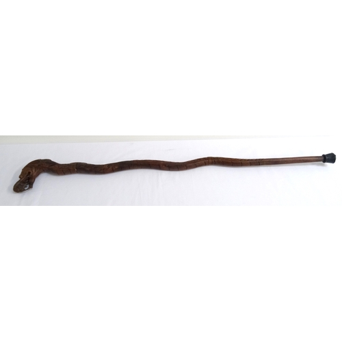 210 - EAST ASIAN TEAK WALKING STICK
carved as a decorative dragon with its open mouth forming the handle, ... 