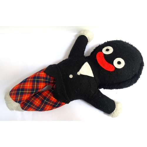 262 - 1960s GOLLY SOFT TOY
wearing black top and trews, 56cm high