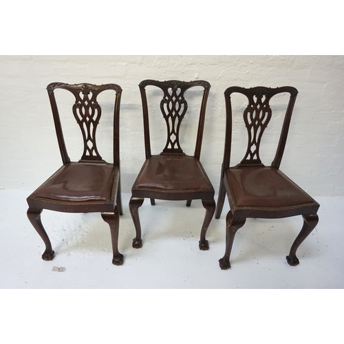 442 - SET OF THREE CHIPPENDALE STYLE DINING CHAIRS
with a shaped top rail above a carved and pierced centr... 