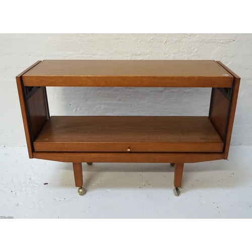 446 - RETRO TEAK EFFECT COMBINATION SERVING TABLE
with an upper and lower shelves with rotating action , s... 