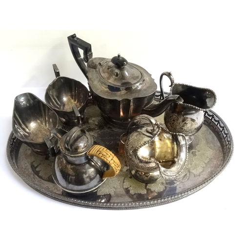 136 - MIXED LOT OF SILVER PLATE
including an old Sheffield plate oval tray with a pierced gallery decorate... 