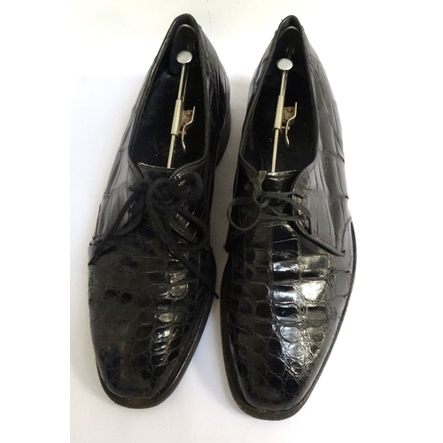 198 - PAIR OF GENTLEMAN'S JOHN LOBB SHOES
in black crocodile, size 7.5, with adjustable metal shoe trees