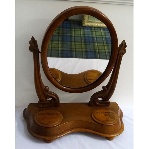 429 - VICTORIAN MAHOGANY DRESSING TABLE MIRROR
the oval adjustable plate flanked by carved arms, the shape... 