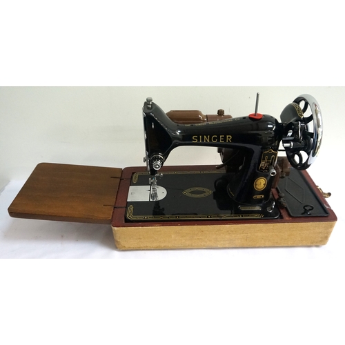 209 - VINTAGE 'SINGER MANUFACTURING CO.' SEWING MACHINE
numbered 'EM715277', with a few small accessories ... 