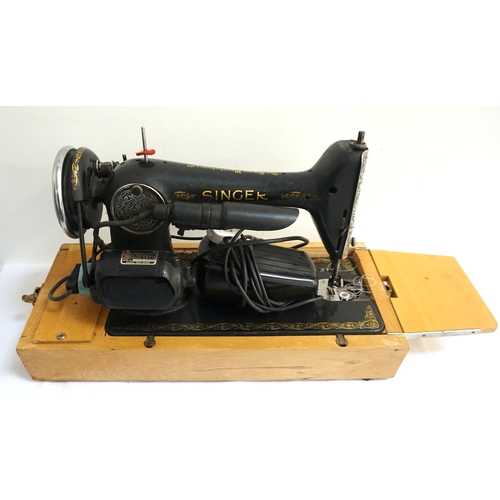 214 - VINTAGE 'SINGER MANUFACTURING CO.' SEWING MACHINE
numbered 'Y9816940', with a few small accessories ... 