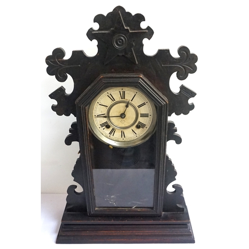 223 - THE ANSONIA CLOCK COMPANY OF NEW YORK MAHOGANY MANTEL CLOCK
contained in a shaped case with a glazed... 