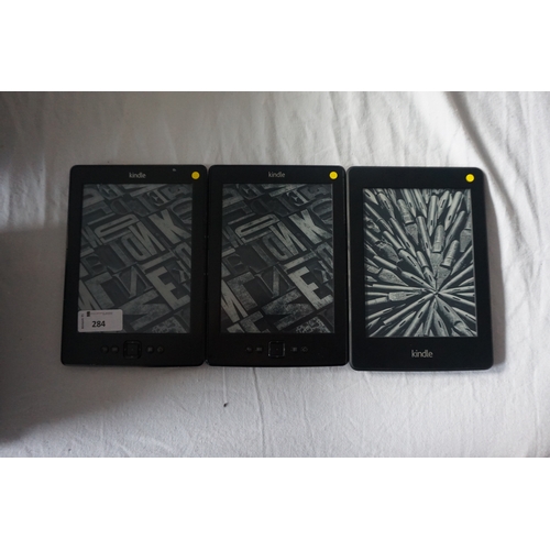 284 - SELECTION OF THREE KINDLE DEVICES
comprising: one KINDLE PAPERWHITE 2 (2013) WIFI, serial numbers: 9... 