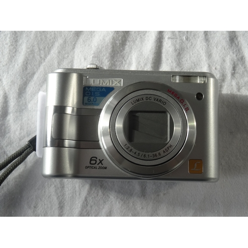 357 - PANASONIC LUMIX COMPACT DIGITAL CAMERA
6MP, 6X optical zoom, together with protective case