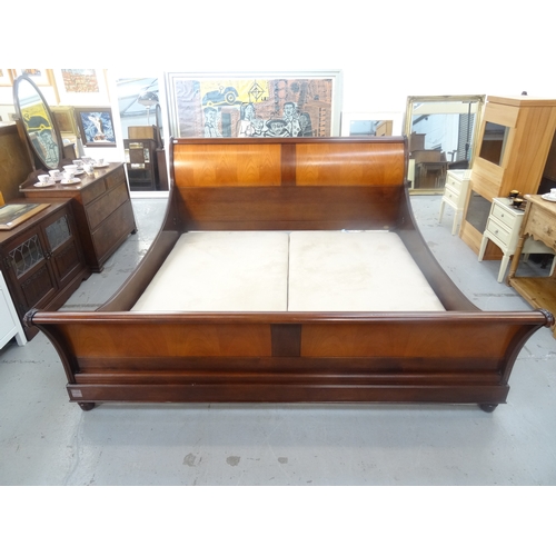 411 - AND SO TO BED SUPER KING SIZE CHERRY SLEIGH BED
with shaped panel head and foot boards and shaped si... 