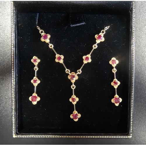 27 - ATTRACTIVE RUBY SET NECKLACE AND MATCHING DROP EARRINGS
all in nine carat gold, the necklace with ru... 