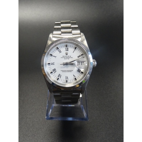 35 - GENTLEMAN'S ROLEX OYSTER PERPETUAL WRISTWATCH
the circular white dial with Roman numerals and baton ... 