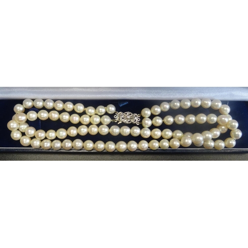 68 - DOUBLE STRAND PEARL NECKLACE
with diamond set nine carat white gold clasp, approximately 37cm long