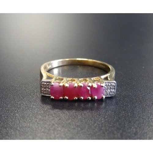 75 - RUBY AND DIAMOND RING
the four oval cut rubies flanked by four small diamonds to each shoulder, on n... 