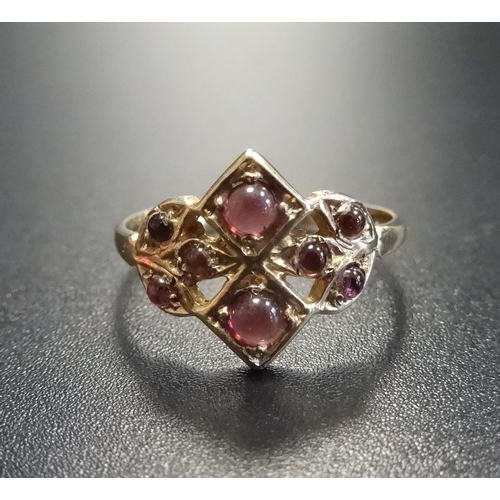 82 - GARNET CLUSTER RING
the eight cabochon garnets in nine carat gold setting, ring size N  -  RE-OFFERE... 