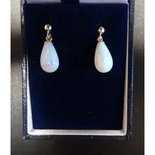 101 - PAIR OF OPAL DROP EARRINGS
the teardrop shaped opals in gold mounts