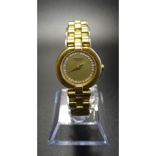 141 - LADIES RAYMOND WEIL GOLD PLATED WRISTWATCH
the gilt dial set with diamonds, on gold plated bracelet ... 