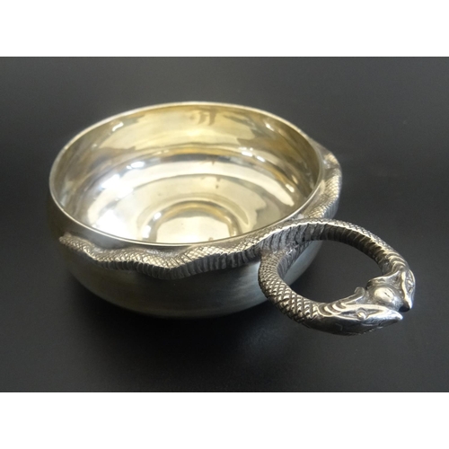 185 - UNUSUAL SILVER SOMMELIER'S CUP
with entwined double snake handle, hallmarks for London 1936, maker W... 