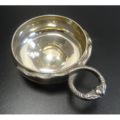 185 - UNUSUAL SILVER SOMMELIER'S CUP
with entwined double snake handle, hallmarks for London 1936, maker W... 