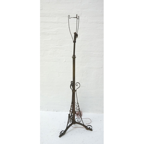 508 - EDWARDIAN BRASS ADJUSTABLE FLOOR LAMP
raised on decorative tripod base, approximately 169cm total he... 